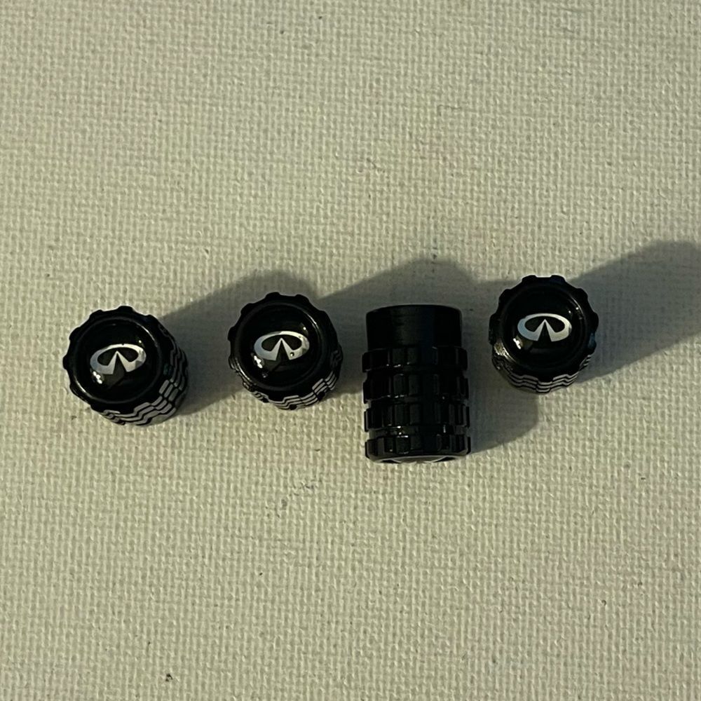 Infinity valve Stem caps in black set of 4 NWT